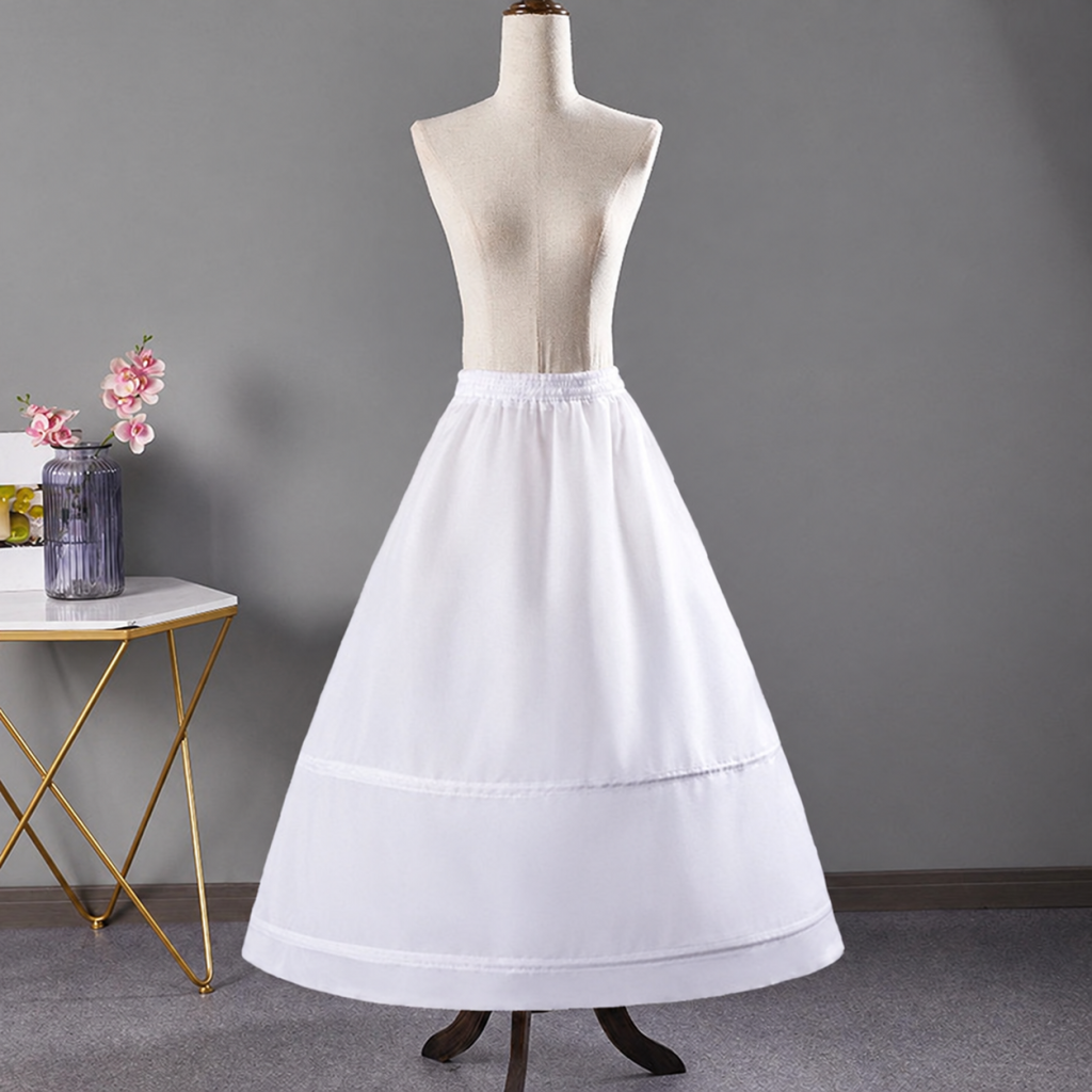 White skirt petticoat displayed beneath a dress form