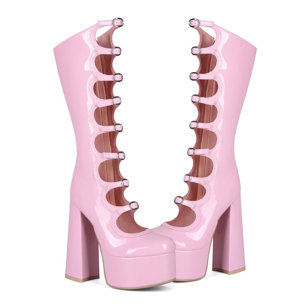 Pink buckle-front platform boots — pair, front three-quarter view