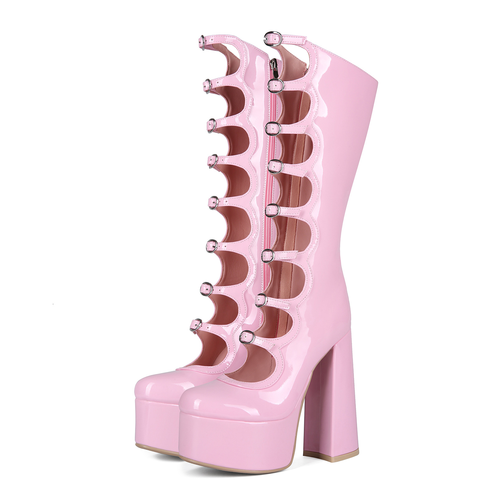Pink buckle-front platform boots — pair with side zipper visible