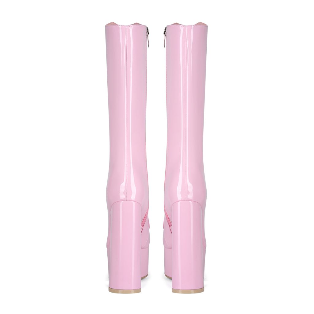 Pink buckle-front platform boots — rear view