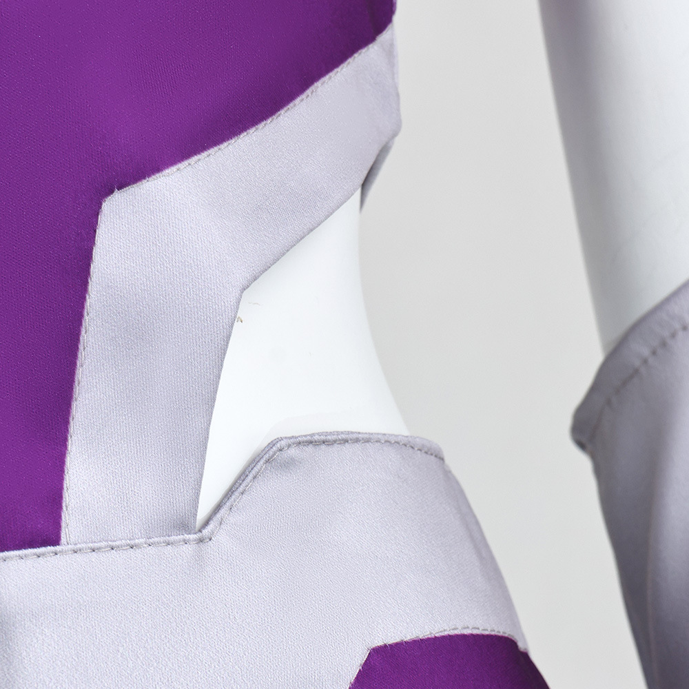 Close-up of purple costume fabric and side seam