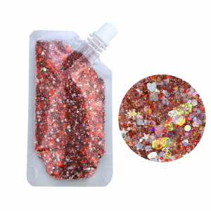 Red cosmetic glitter gel pouch and mixed-size glitter close-up