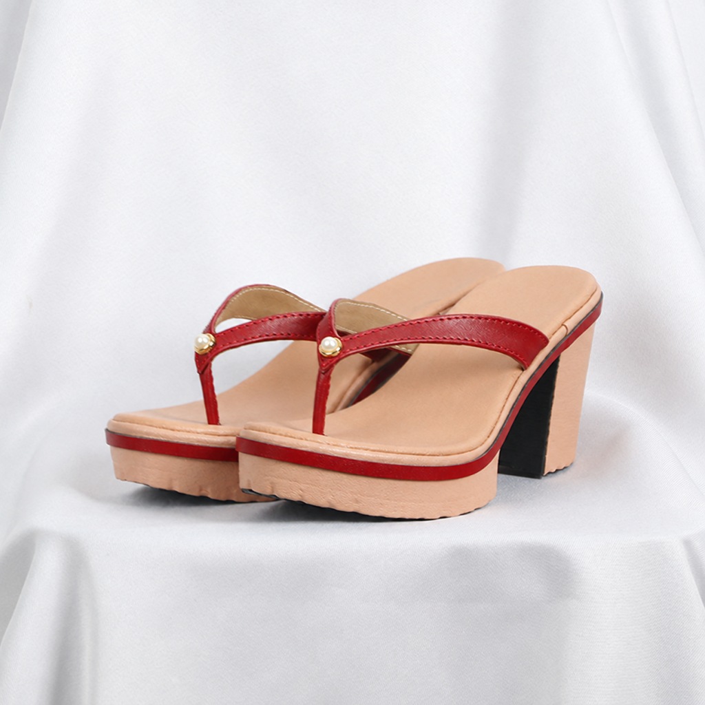 Tan platform heeled thong sandals with red straps, pair