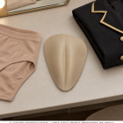 AI wardrobe concept of Nude smooth triangular insert beside costume layers