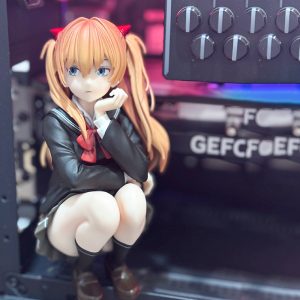 Asuka crouching figurine with orange pigtails and dark school uniform; computer setting not included