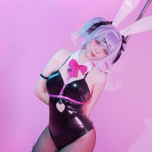Hatsune Miku Rabbit Hole black bunny bodysuit with pink trim on model