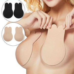 Nude rabbit-ear adhesive bra pads worn under an outfit with black and nude pairs shown