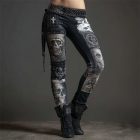 Black skull patchwork leggings worn with boots