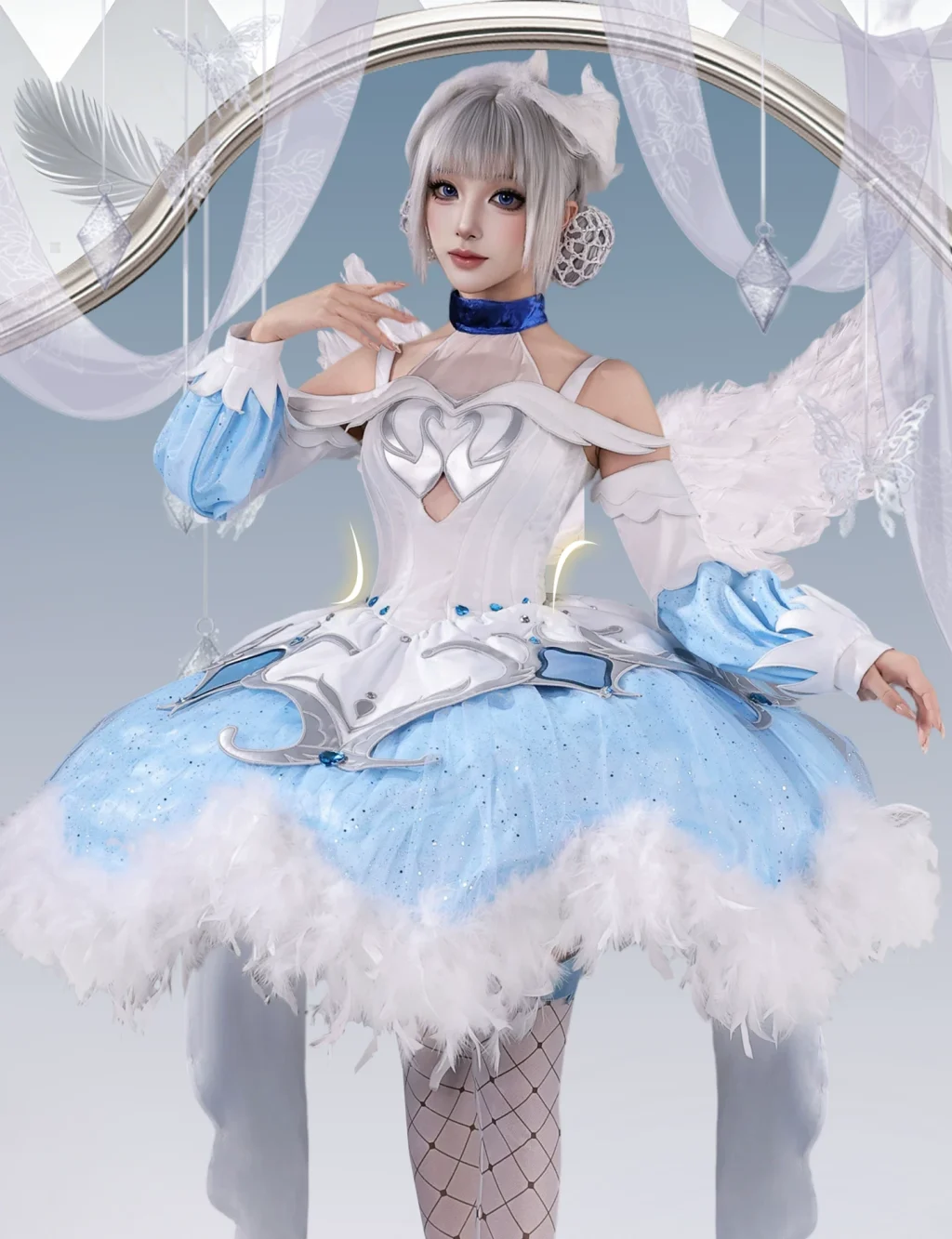 White bodice and pale blue feather-trimmed Xiao Qiao swan costume worn