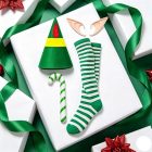 Christmas elf hat, ears, striped socks and candy cane accessory kit laid out together