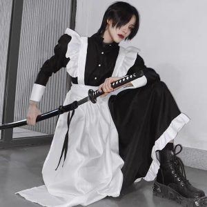 Women's-cut black and white maid dress with apron and ruffled shoulders