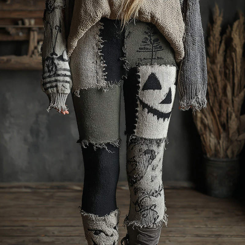 Gray patchwork leggings with a stitched jack-o face