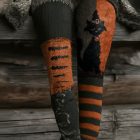 Black witch-hat cat leggings with orange stripes