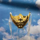 Gold sculpted lower-face mask with side ties