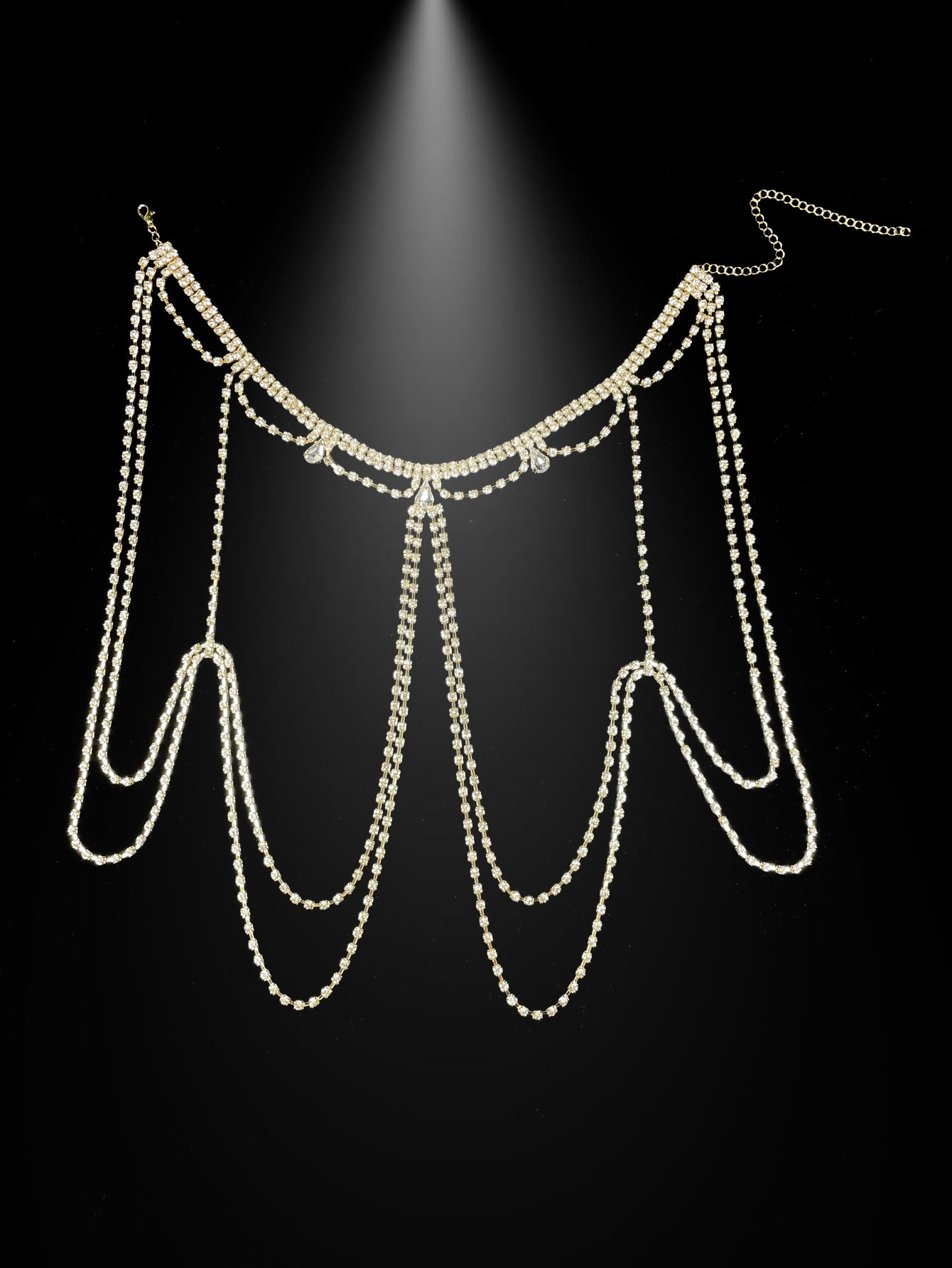 Gold rhinestone shoulder chain with scalloped drapes
