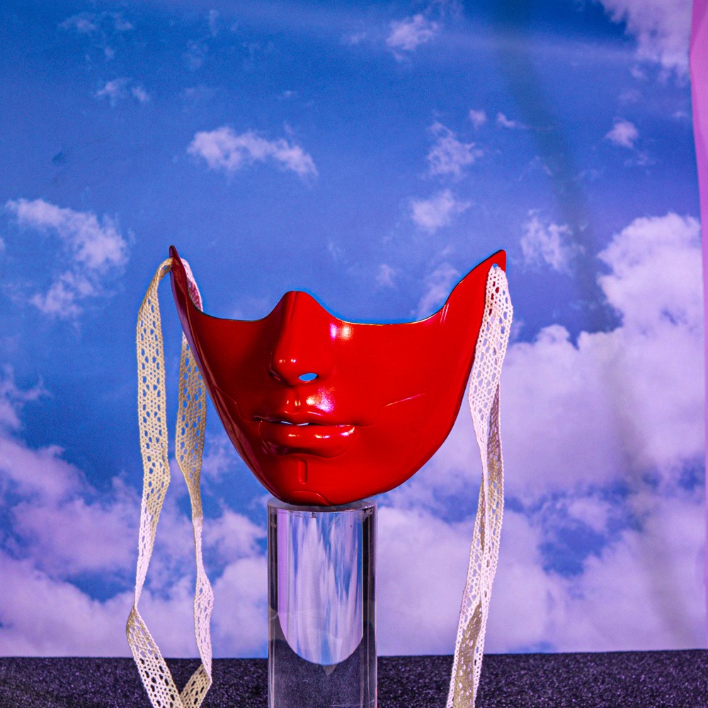 Red mechanical lower-face mask with side ties