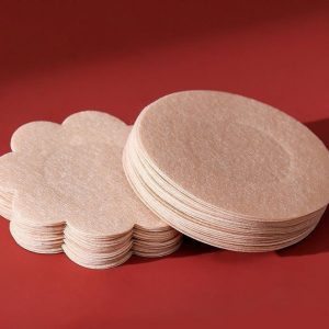 Dark beige flower-shaped adhesive patch stack beside circular example