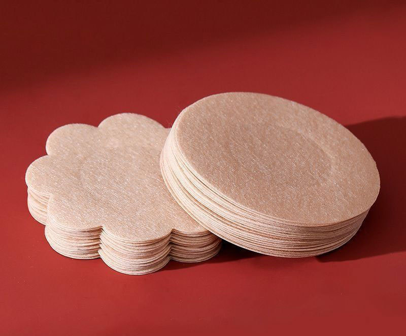 Dark beige flower-shaped adhesive patch stack beside circular example