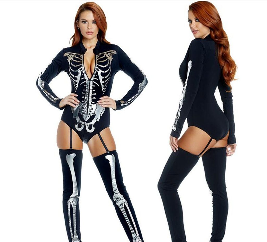 Front and back views of black front-zip skeleton bodysuit with silver bone print and thigh-high leg pieces